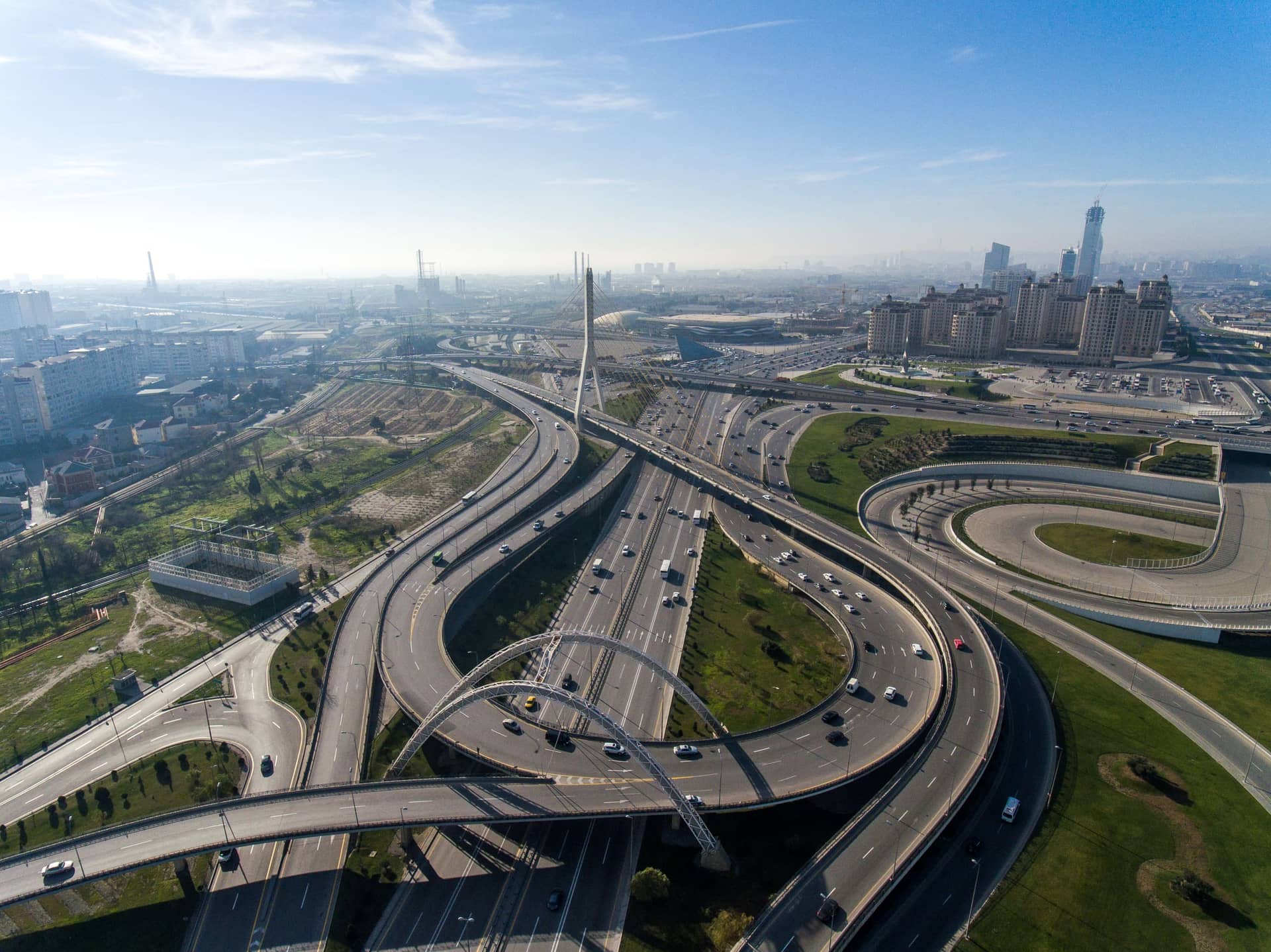 Aerial view of a U.S. highway interchange at sunset: the infrastructure Metro Associates staffs